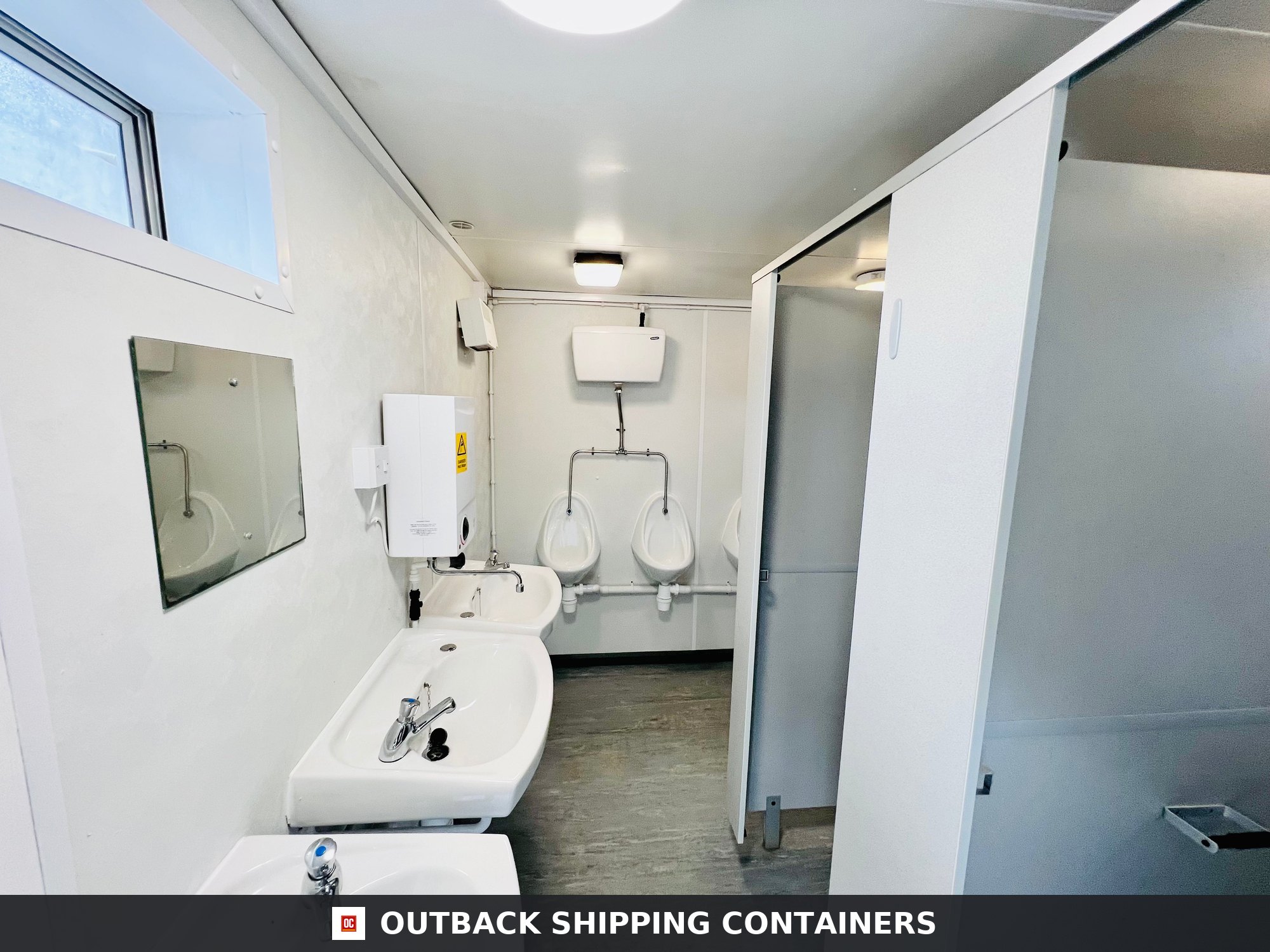 Toilet Block + Shower for Sale — Interior View | Outback Shipping Containers Toilet Block + Shower — 24 x 9 ft — 4 + 1 Toilet with Separate Shower Room — No 882 — product gallery image 4 of 15