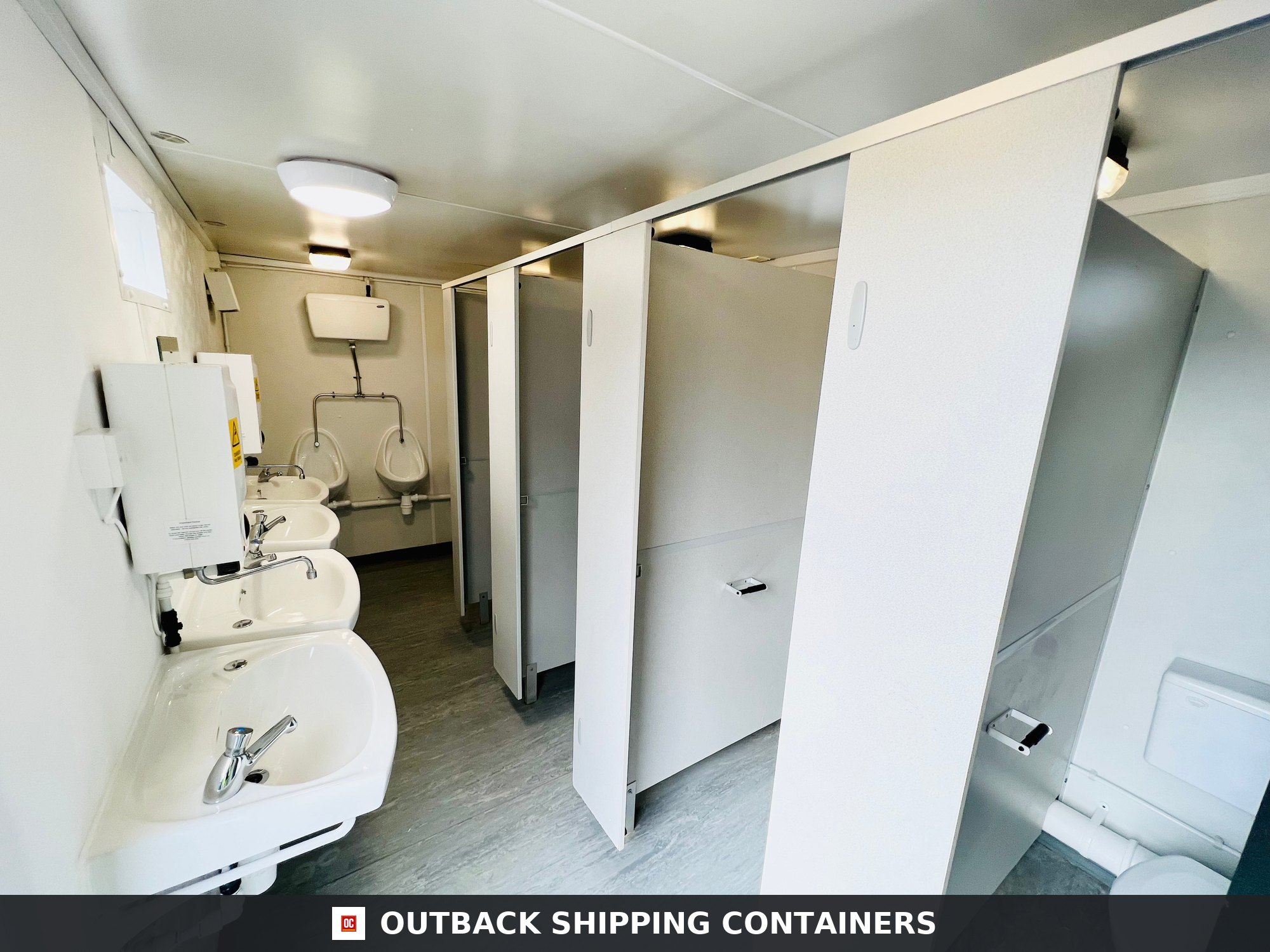 Toilet Block + Shower for Sale — Three-Quarter Angle View | Outback Shipping Containers Toilet Block + Shower — 24 x 9 ft — 4 + 1 Toilet with Separate Shower Room — No 882 — product gallery image 2 of 15