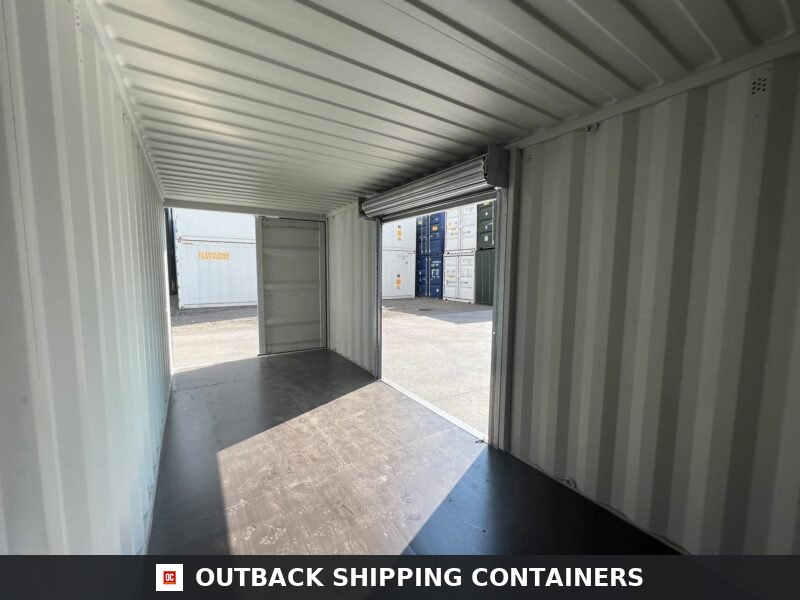 20ft Custom One Trip Shipping Container — Rear Exterior View | Outback Shipping Containers Interior view of a 20ft custom shipping container featuring a side roller shutter and RAL 7035 light grey paint