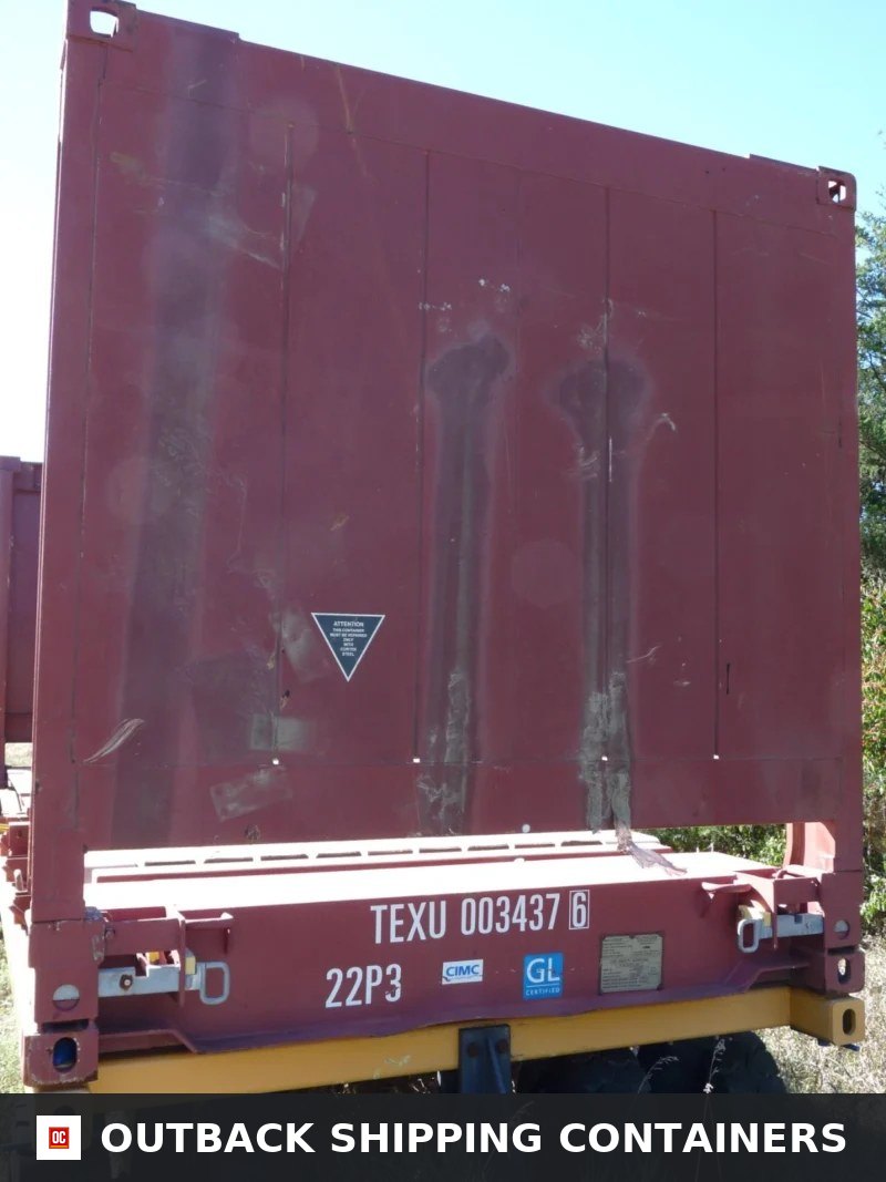 20ft flat rack shipping container end wall with red steel finish and white identification stenciling at the base