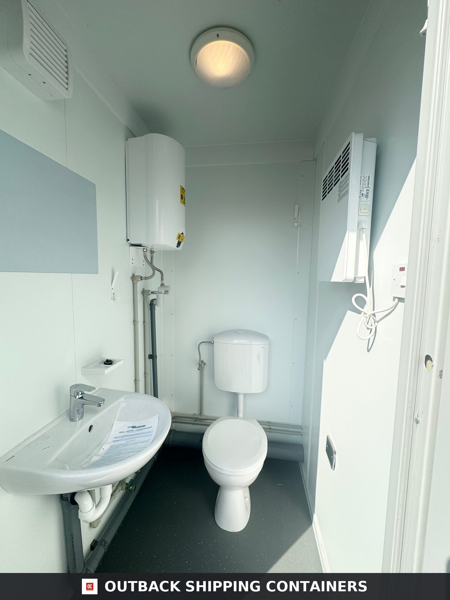 4 Bay Toilet Block for Sale — Three-Quarter Angle View | Outback Shipping Containers 4 Bay Toilet Block — 4 WCs — 10 x 8 ft NEW Portable — 4 Toilets, 4 Basins — Grey — No 795 — product gallery image 2 of 14