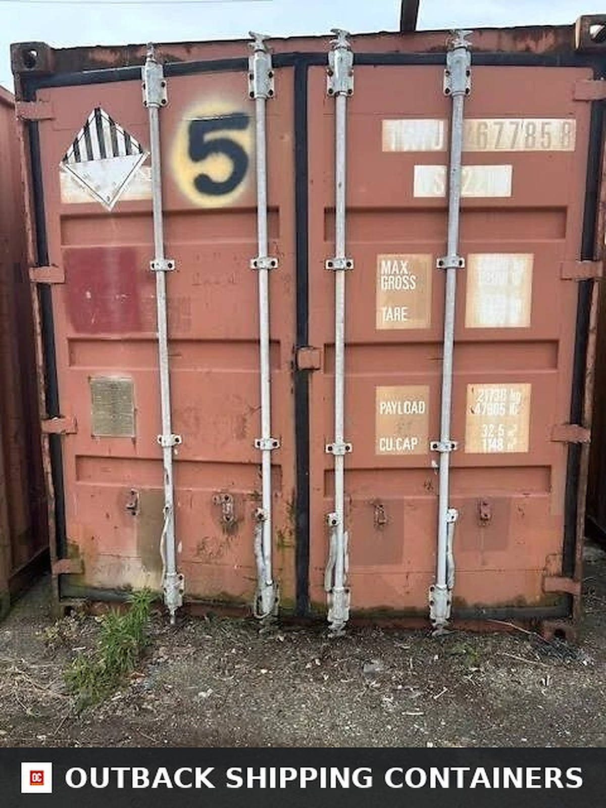 Used 20 foot shipping container rear doors with steel locking bars and cargo decals