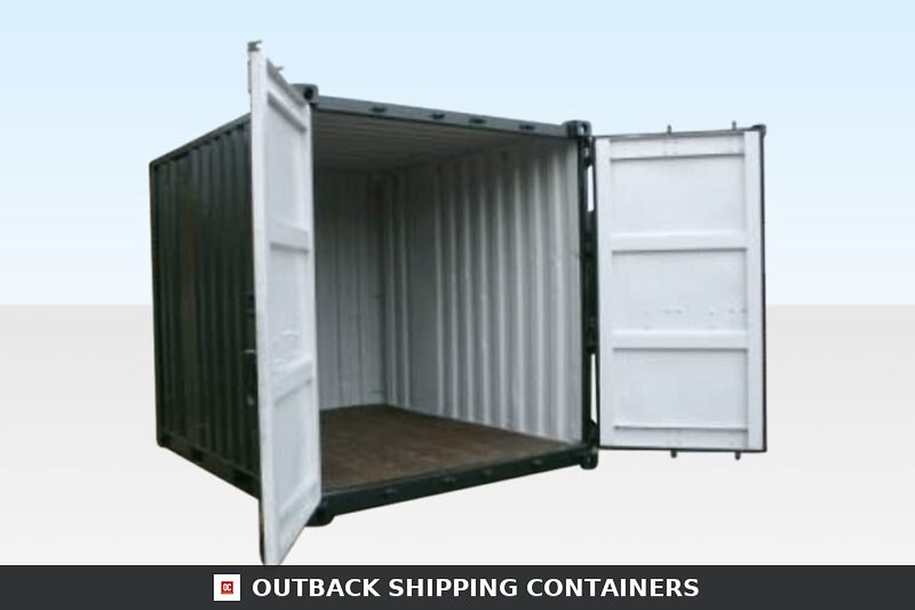 Interior view of an open 10ft cut down used container with white doors and dark exterior