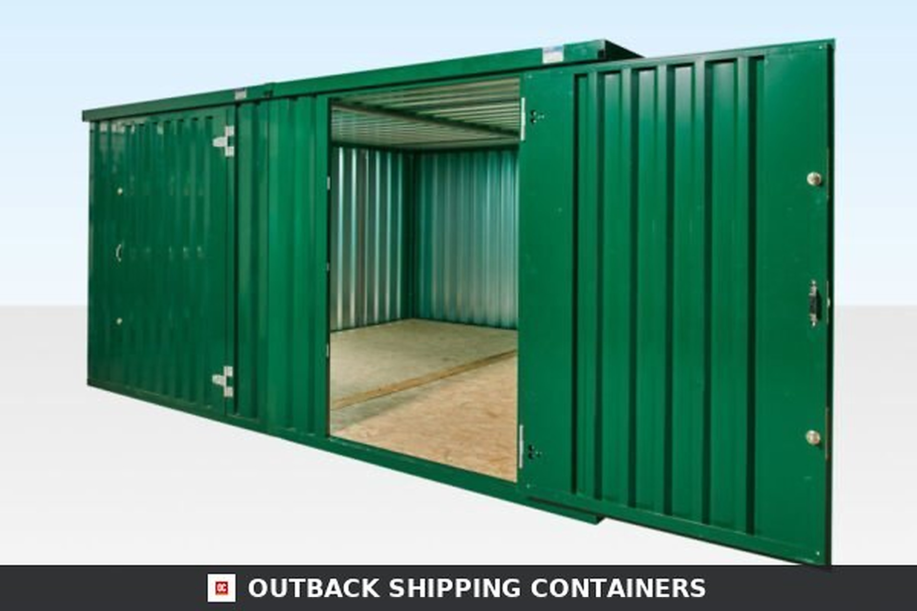 Green side linked flat pack container bundle with open double doors showing an empty interior and wooden flooring