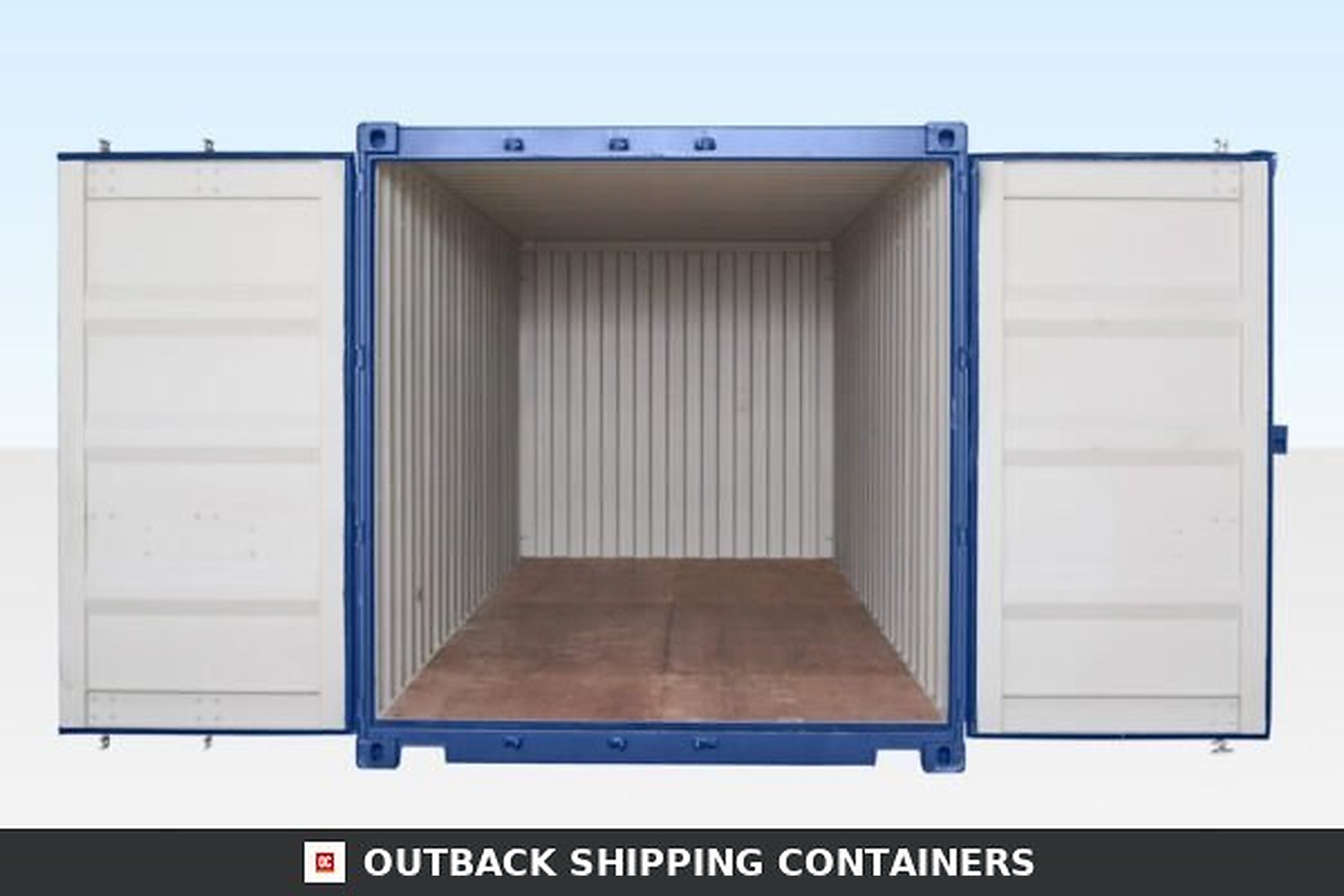 Interior view of an open 20ft shipping container with clean corrugated steel walls and plywood flooring