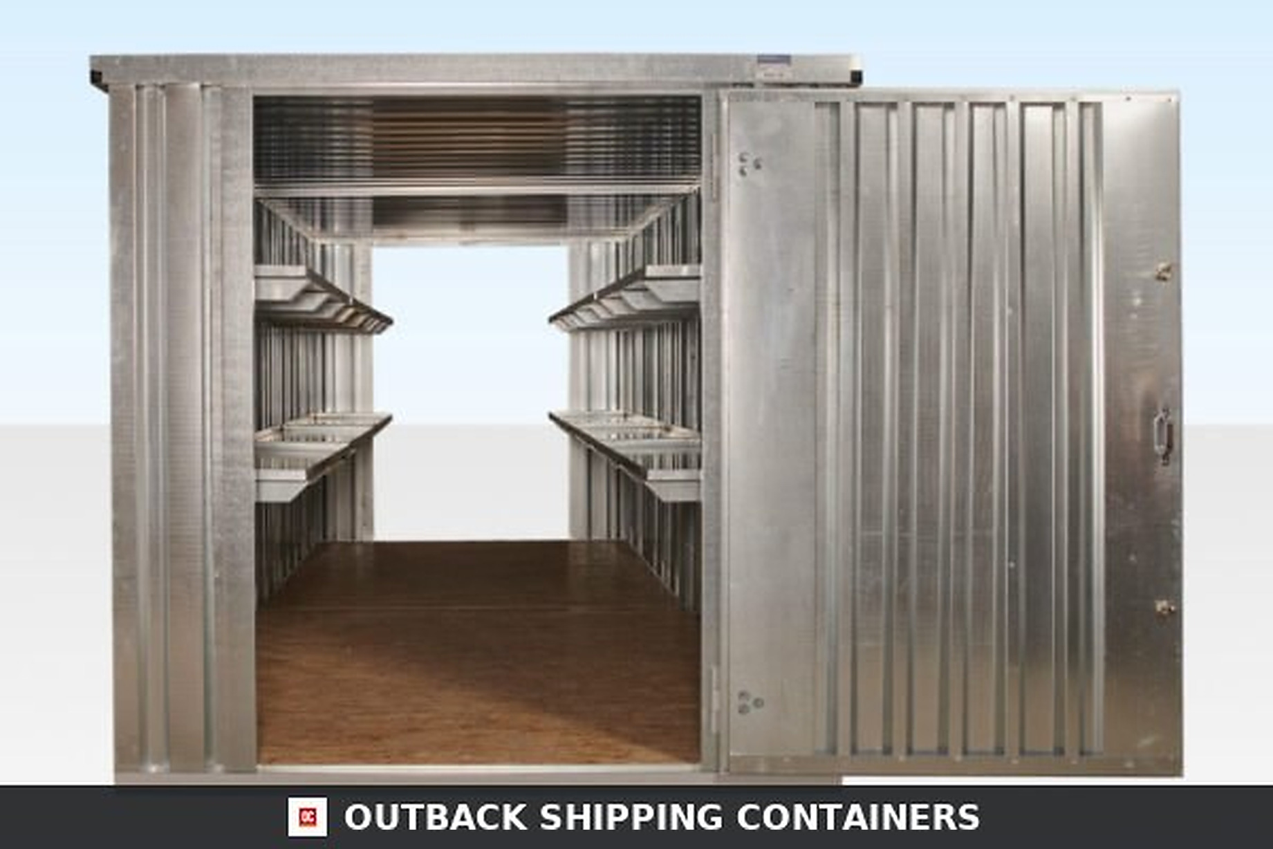 Interior view of an end linked flat packed container with metal shelving and open front door