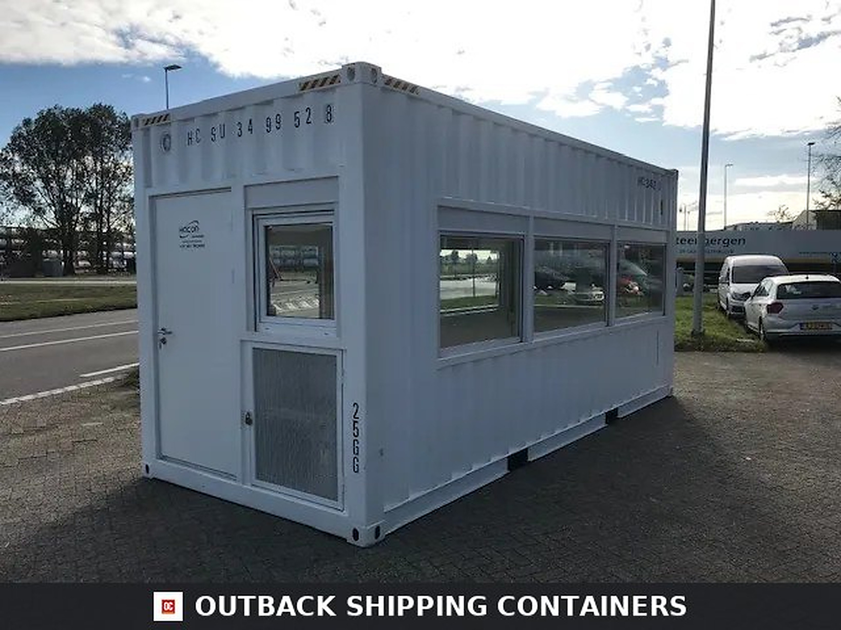 20ft High Cube Fixed Glazing Observation Container 20ft high cube white shipping container with fixed glazing windows and a personnel door on a paved lot