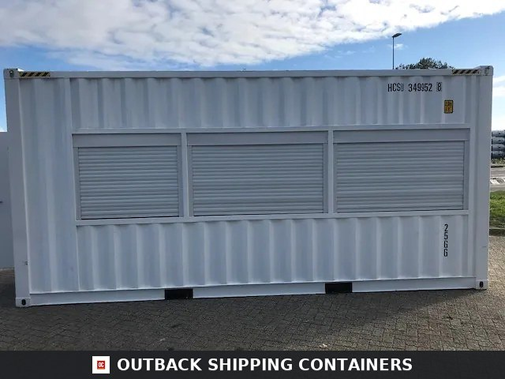 Side profile of white 20ft high cube container with three closed security rolling shutters over glass windows